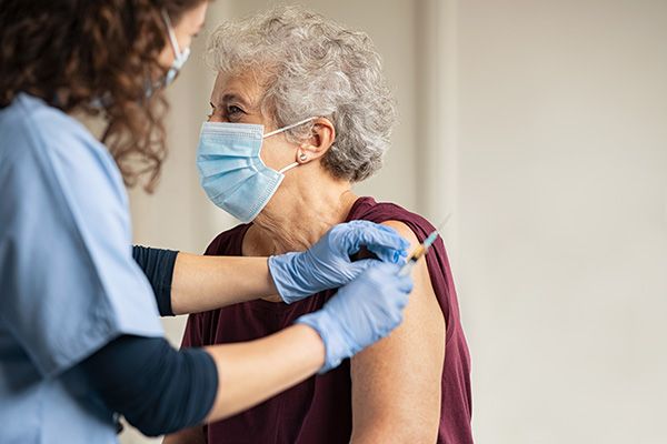 A patient receiving a vaccination